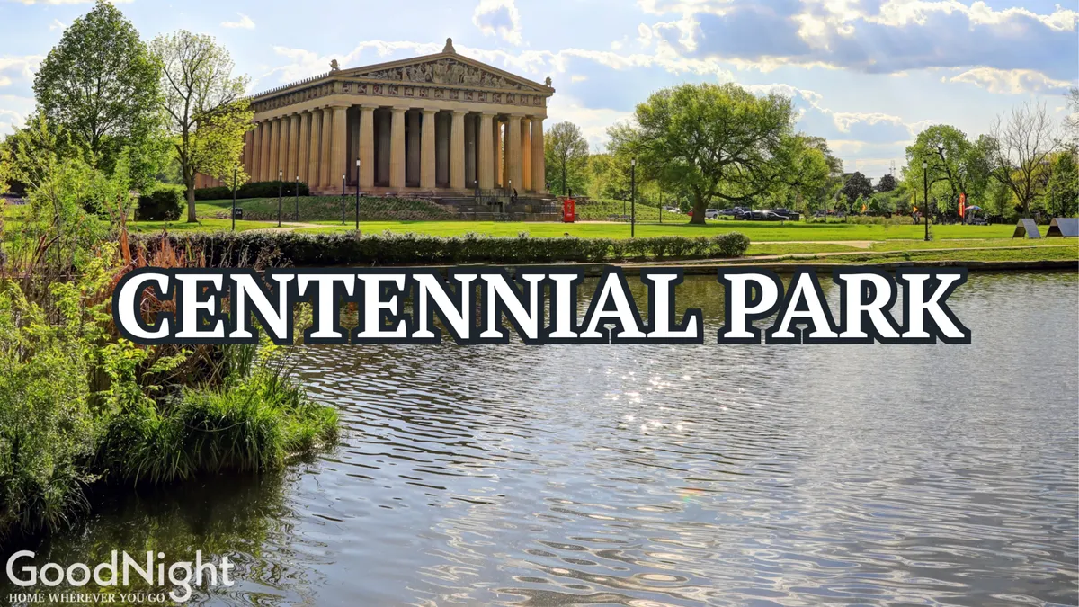 This image presents the iconic Parthenon-like structure in Centennial Park, surrounded by lush greenery and a tranquil lake. The scene is peaceful, with ample space for walking, picnicking, or enjoying outdoor activities—ideal for families and groups seeking parkside fun and exploration.